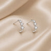 White gold earrings with small zirconia