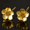 Classic Gold Flower Earrings with Gold Center Detail