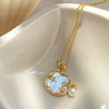 Gold Necklace with Moonstone and Pearls